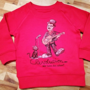 KinderRevoluZionspulli Zu sehen sind ZaPPaloTT & Kater ZaPPsel mit dem Schriftzug. RevoluZion. Wer kann das schon? Auf dem Rücken steht dann. ZaPPaloTT-Revoluzion – Jeder kann das!